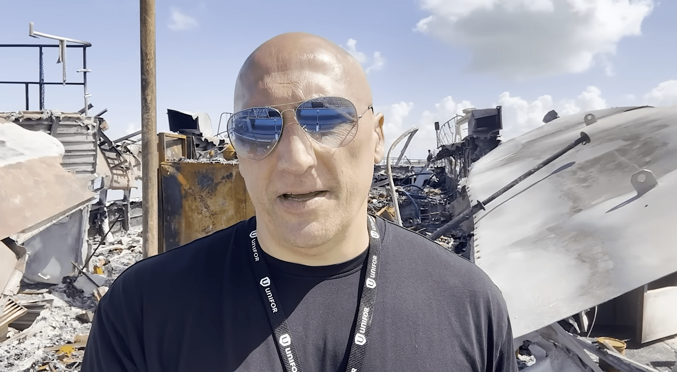 Still image of Dimitri Lascaris reporting from the Iranian port city of Bushehr on March 27, 2026. Photo courtesy of Reason2Resist with Dimitri Lascaris.