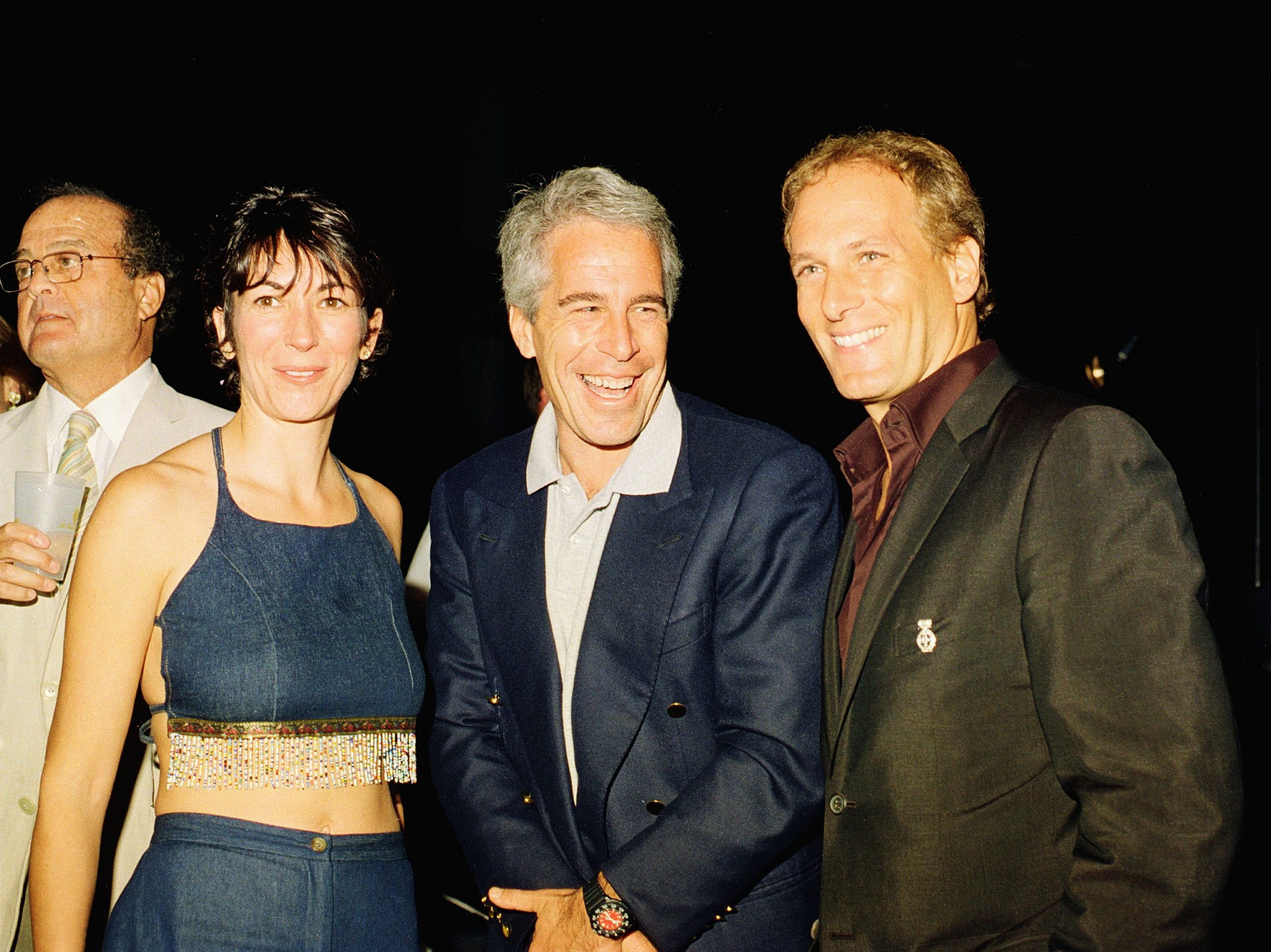 (L-R) Ghislaine Maxwell, Jeffrey Epstein, and musician Michael Bolton pose for a portrait during a party at the Mar-a-Lago club, Palm Beach, Florida, February 12, 2000. Photo by Davidoff Studios/Getty Images