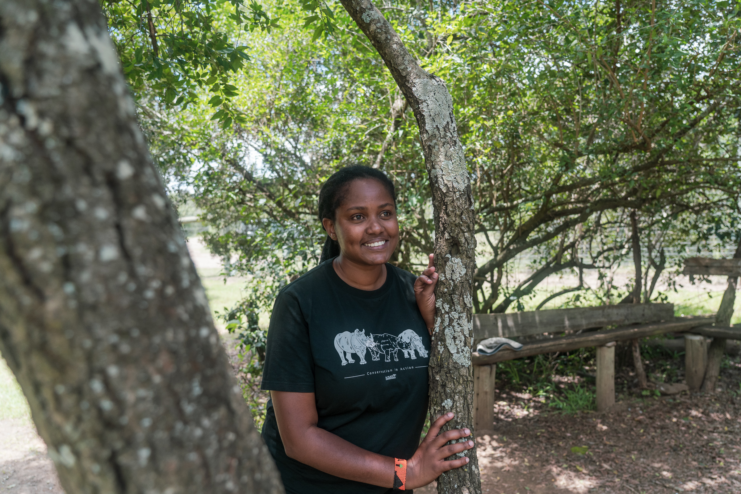 Florence Kanyede, a wildlife veterinarian at Sweetwaters for nearly four years, says watching the chimpanzees reveals friendships, gossip, grooming rituals, and quiet introverts — "really like a mirror to ourselves." Photo by Jaclynn Ashly.